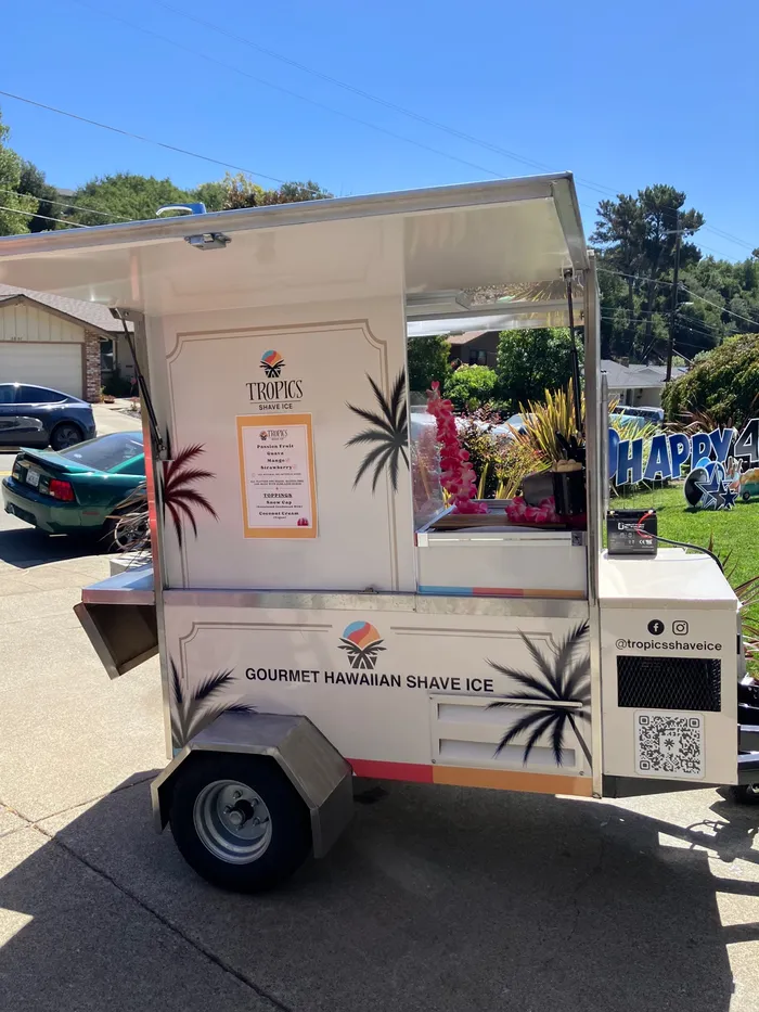 Tropics Shave Ice trailer cart with its service window open